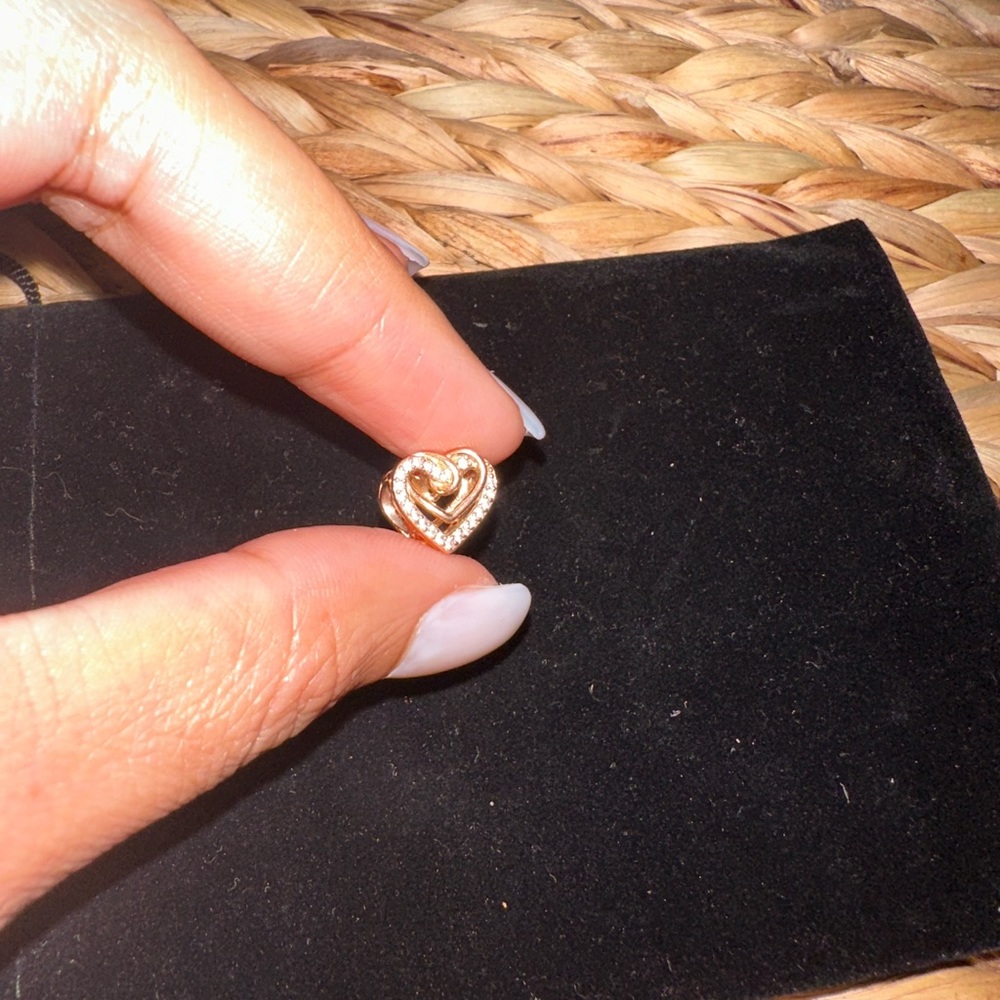 Pandora Rose gold “sparking entwined heart charm” EUC like new!